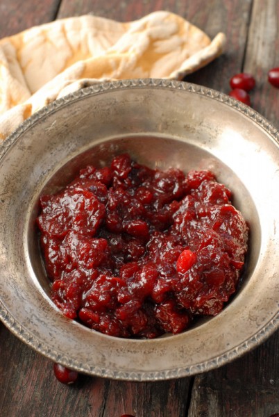 Spicy Honey Cranberry Sauce In silver bowl