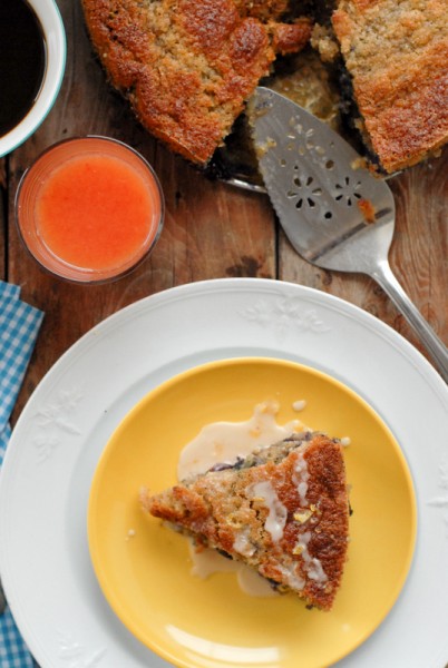 Bluebird Coffee Cake with Lemon Glaze on a yellow plate with cutter