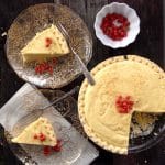 Eggnog Pie sliced on plates and in pie pan