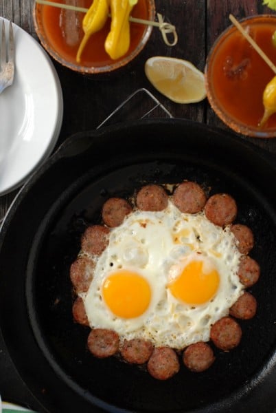 A plate of food and a cup of coffee, with Bloody Mary and Egg