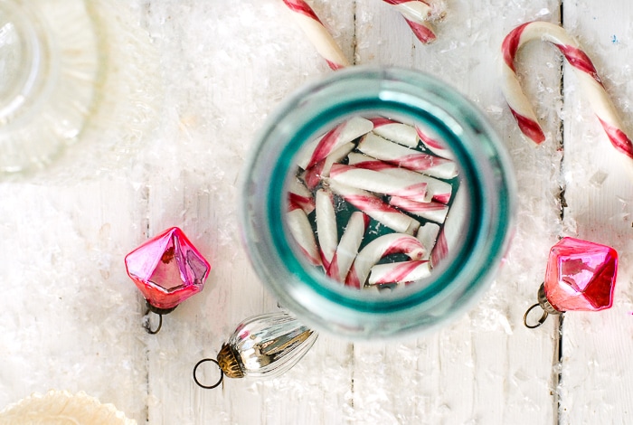 broken candy canes in vintage blue Mason jar