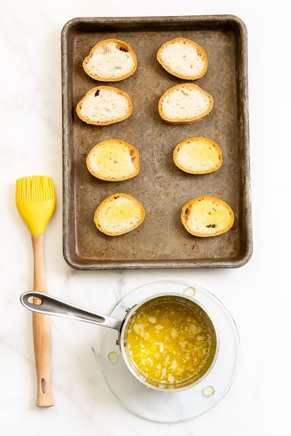 Garlic Toast Rounds on a baking sheet