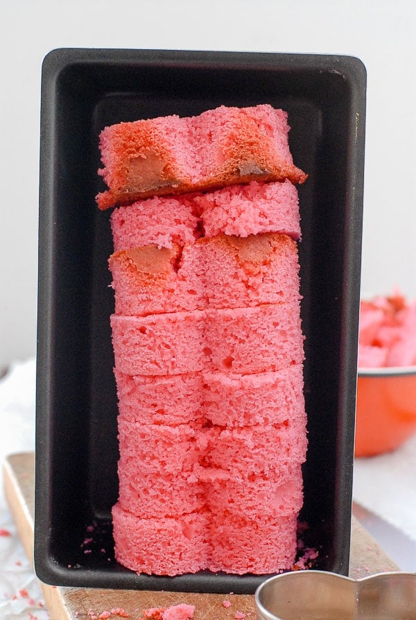 pink pound cake hearts in a loaf pan