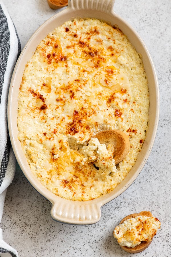 Hot Artichoke Dip with garlic toast rounds