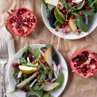 The Best Winter Salad with halved pomegranates