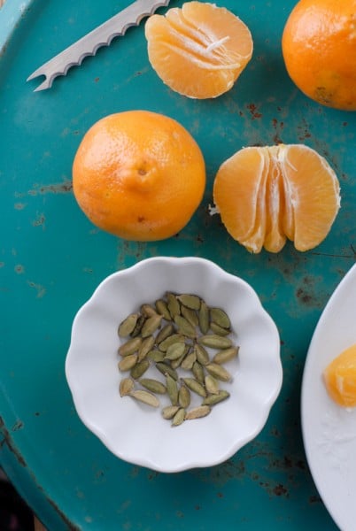 Tangelos and cardamom pods 