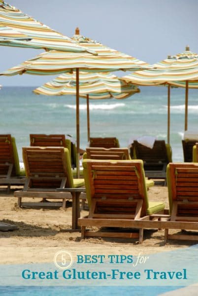 A group of lawn chairs sitting on top of a beach