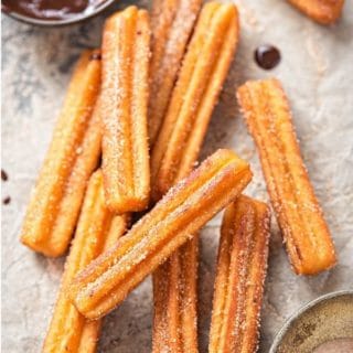 Churros with chocolate dipping sauce and recipe title label