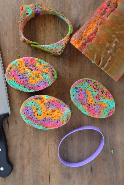 Cutting out Rainbow Eggs for Easter Cake 