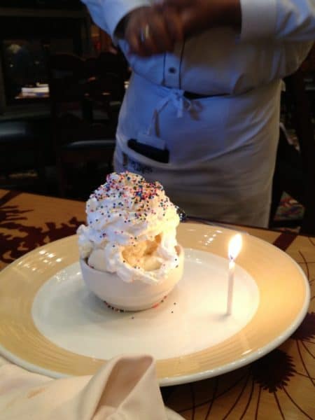 We enjoyed an excellen dining experience at the Storyteller Cafe {Grand Californian Hotel - Disneyland}. The chef walked us through the entire menu and returned at the end of the meal with this gluten-free birthday bowl of ice cream 'with extra sprinkles' for our birthday boy.