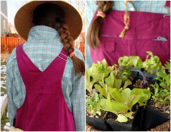 A woman wearing a hat with plants