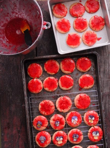 making glazed cookies with edible flowers