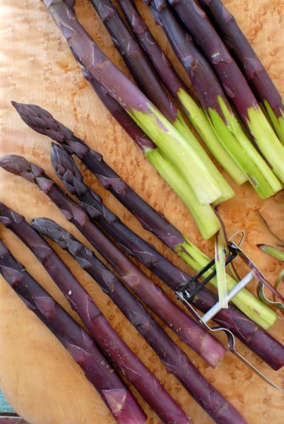 peeling purple asparagus