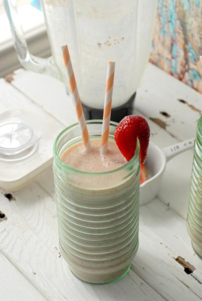 Banana-Peach Almond Smoothie with stripped straws