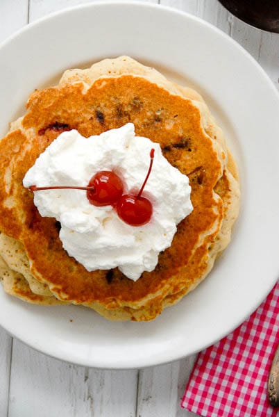Fresh Strawberry Chocolate Chip Pancakes with Whipped Cream from above