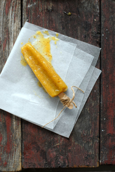 Mango-Kiwi Limeade Popsicles on wax paper