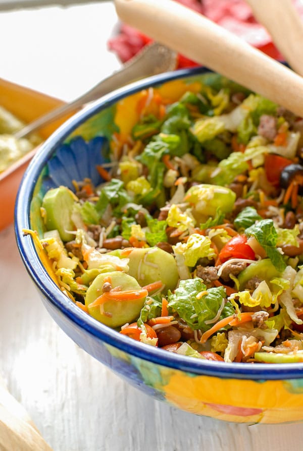 Large bowl of Taco Salad Ole with Avocado Tequila Lime Dressing 