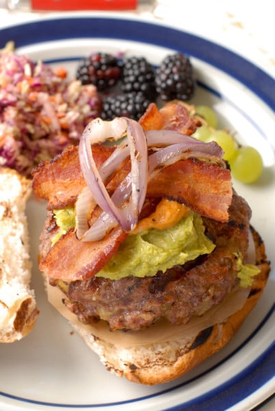 A close up of food on a plate, with Cheeseburger