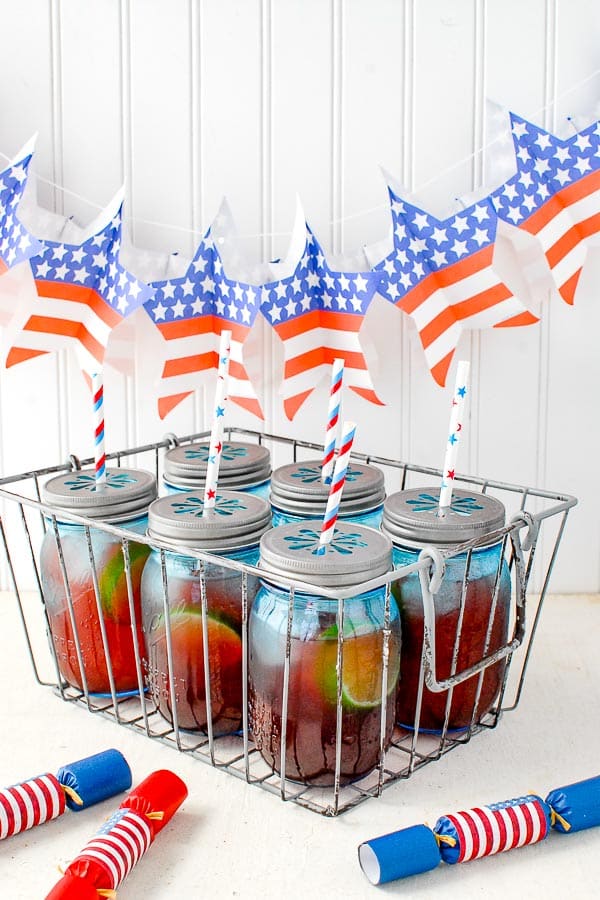 Basket of blue jars filled with Firecracker Punch