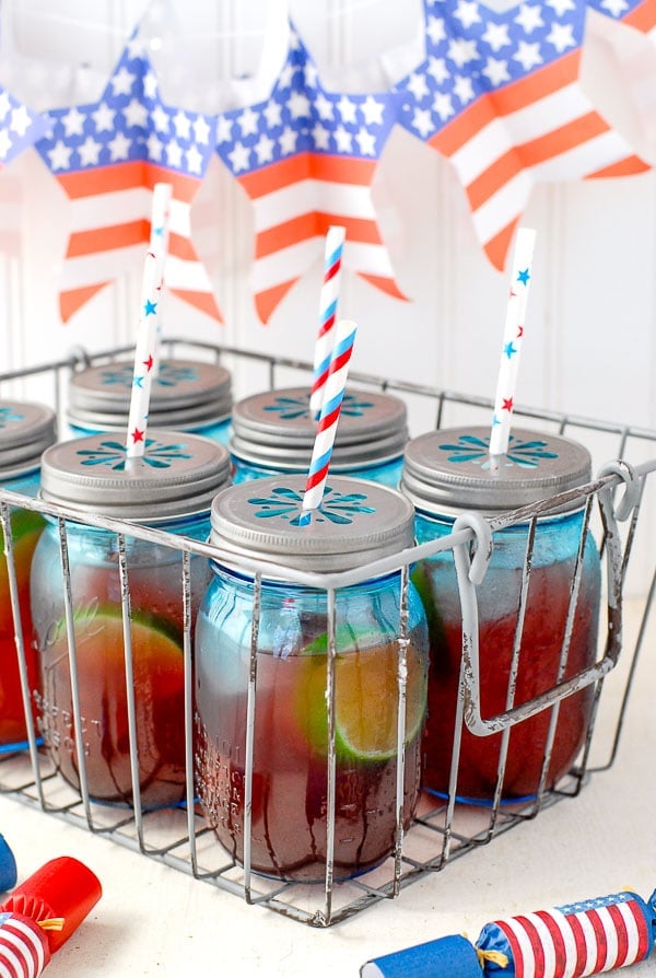 Blue jars of Firecracker Punch recipe for Fourth of July