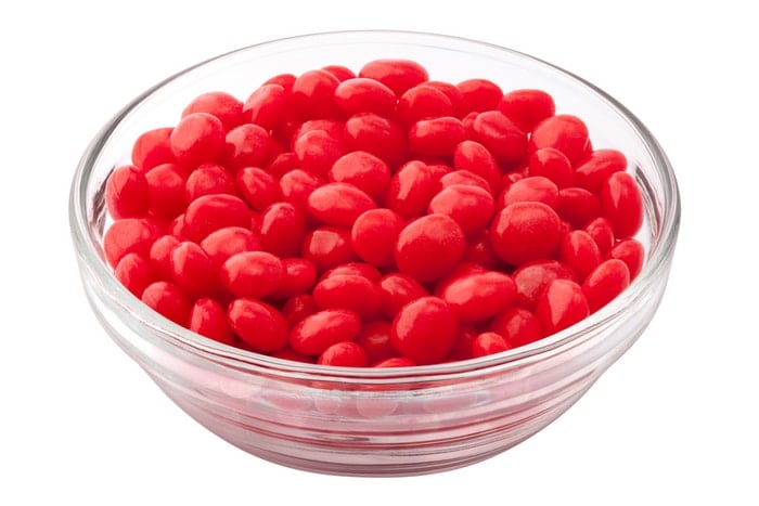 clear bowl of Red Hots candy