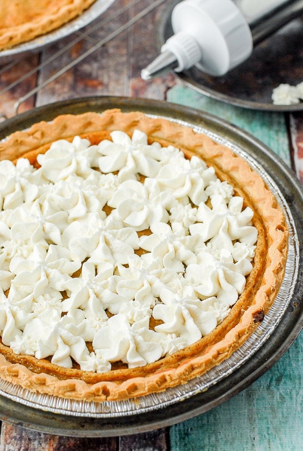 whole raisin pie with whipped cream topping