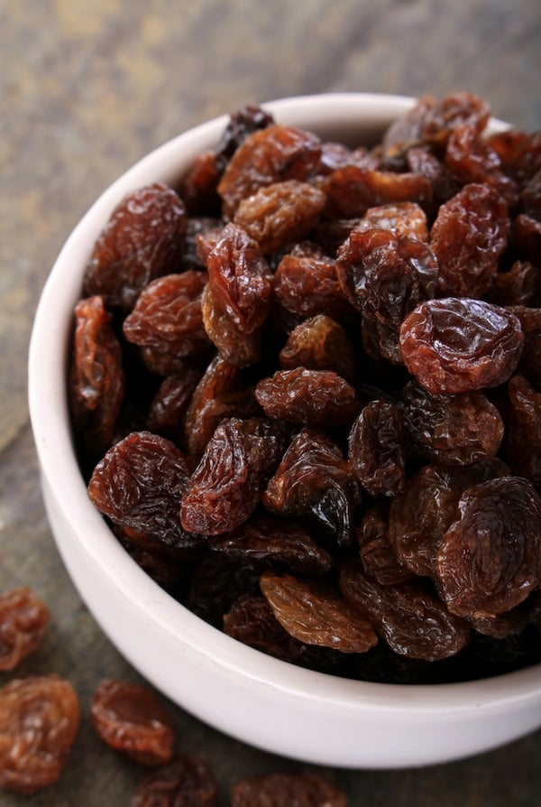 white bowl of raisins