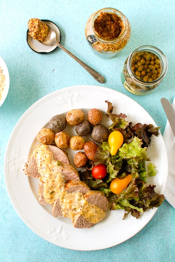 Pork Tenderloin in Mustard Caper Cream Sauce with roasted potatoes, fresh garden salad