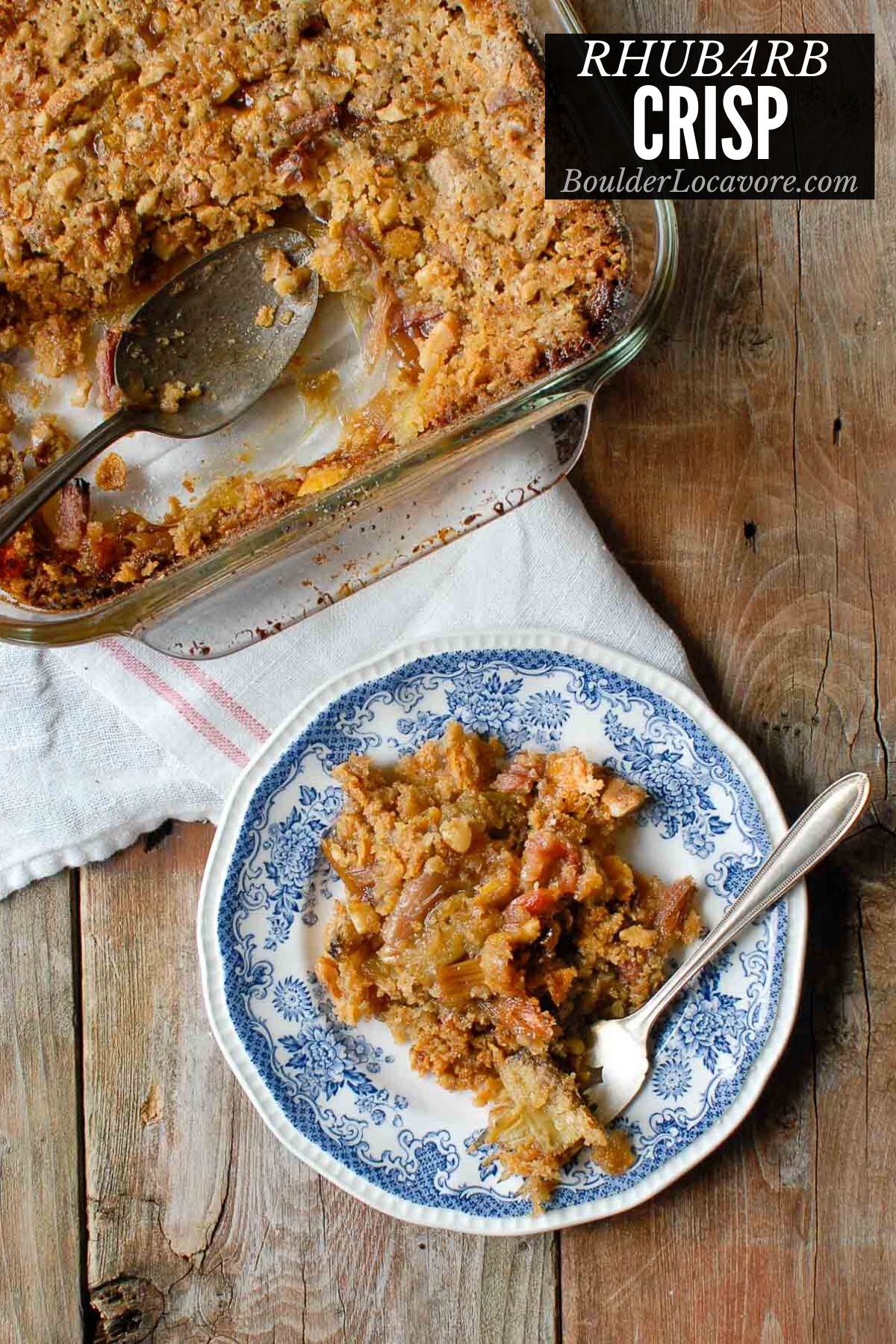 Rhubarb Crisp on a plate with baking dish behind