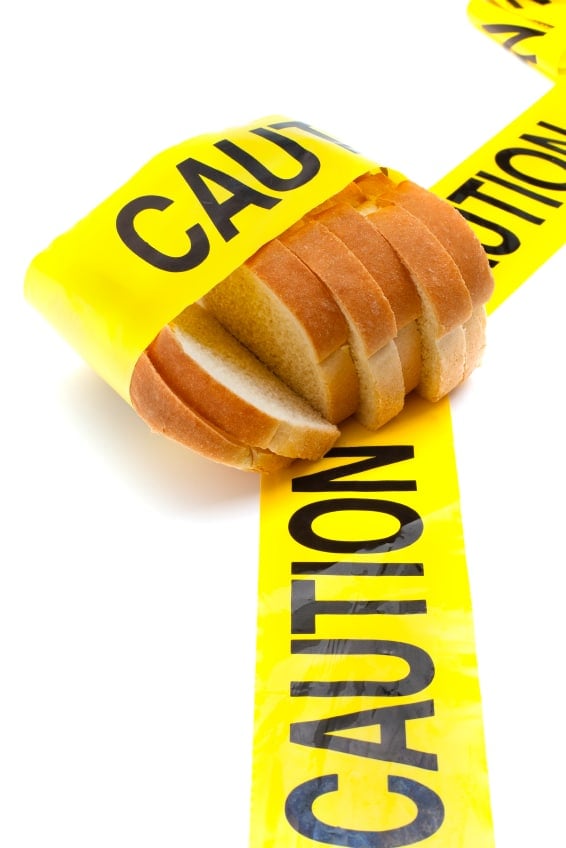 loaf of bread wrapped with caution tape