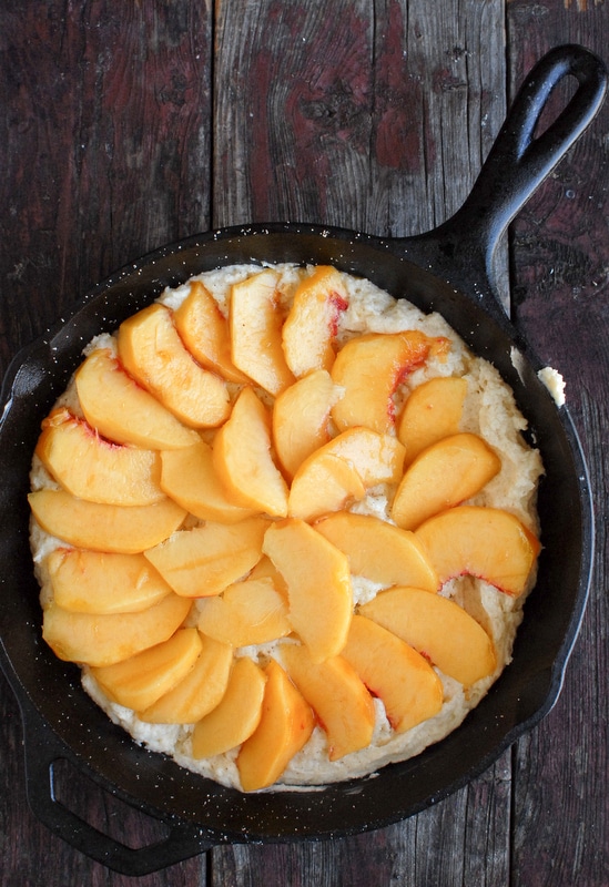 Buttermilk Peach Buckle in a cast iron skillet