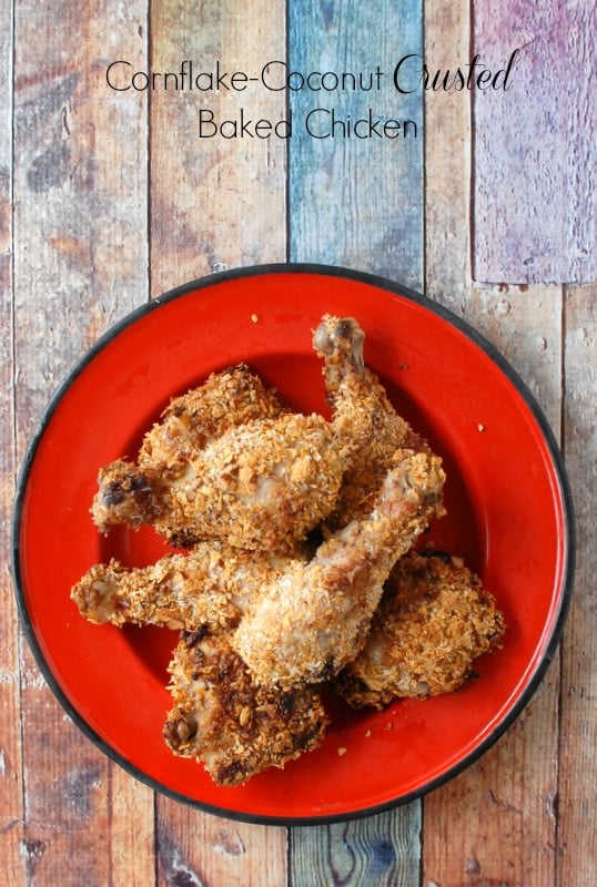 Cornflake Coconut Pecan Baked Chicken on red plate