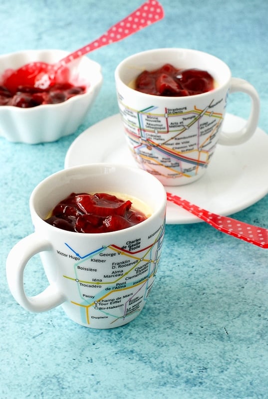 No Bake Vanilla Bean Pots de Creme with fresh Cherry Sauce in French Metro cups  closeup