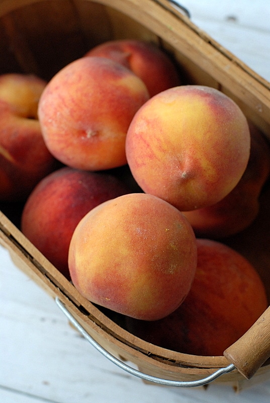 Peaches in wooden basket