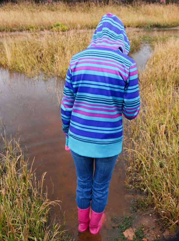 Flooding person standing in water