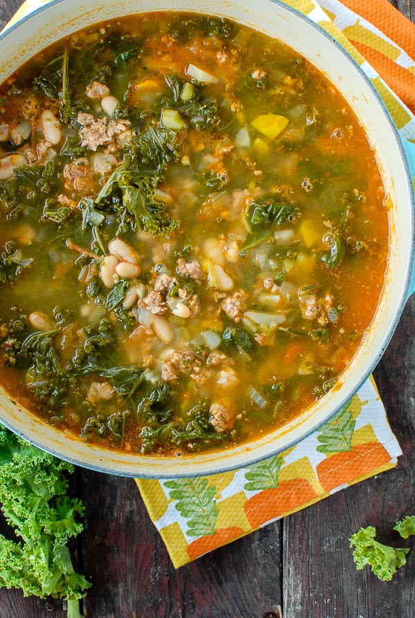 Close up photo of Peppery Sausage White Bean Kale Soup 