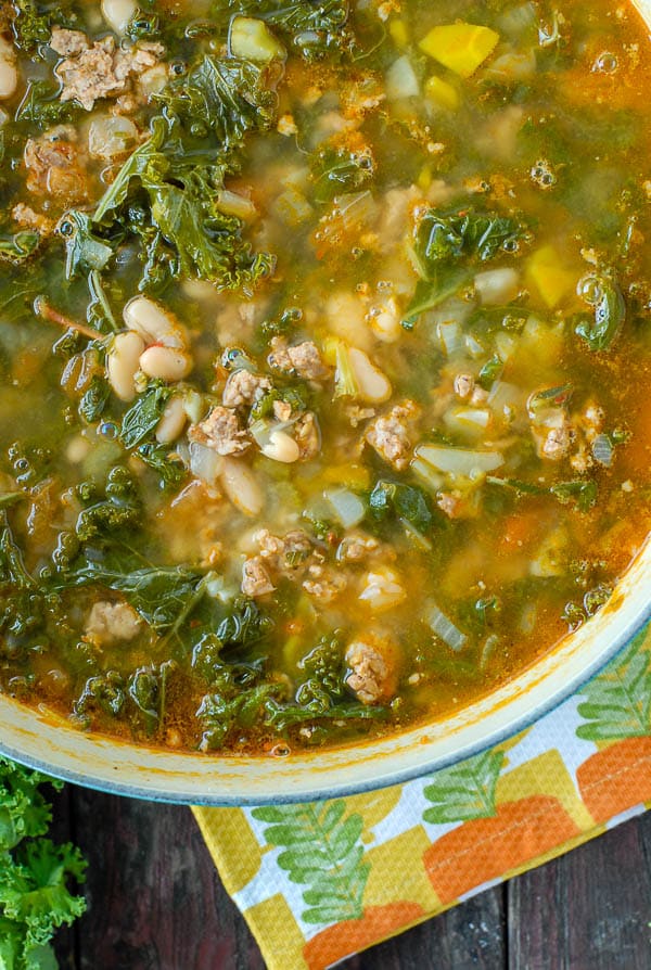 Peppery Sausage White Bean Kale Soup in soup pot