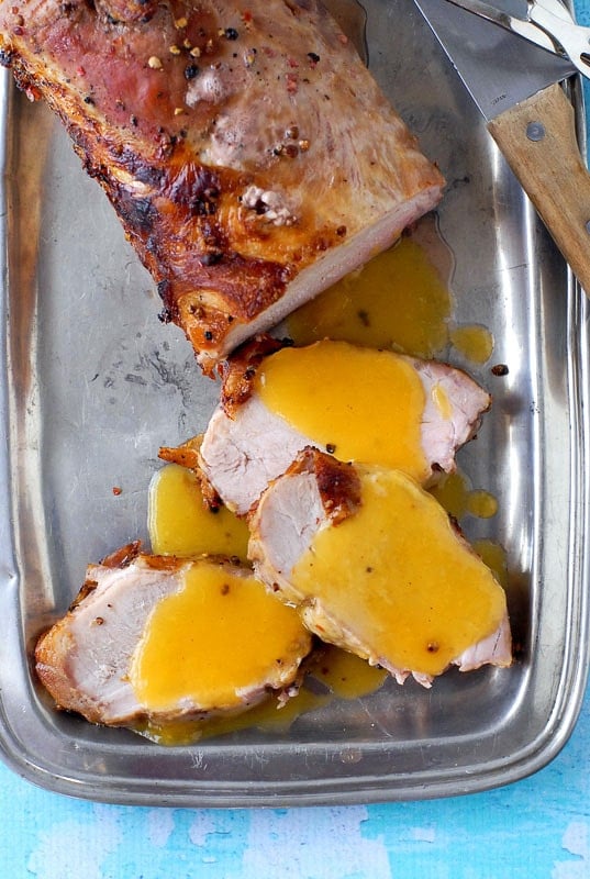 Lemon-Pepper Brined Boneless Pork Loin Roast slices with Fresh Peach-Moscato Sauce 