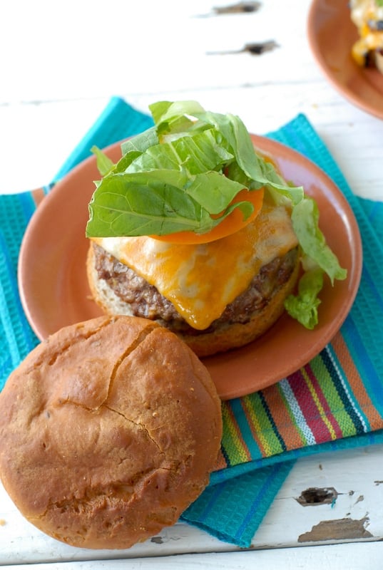 Stuffed Taco Burgers with tomato slice and lettuce