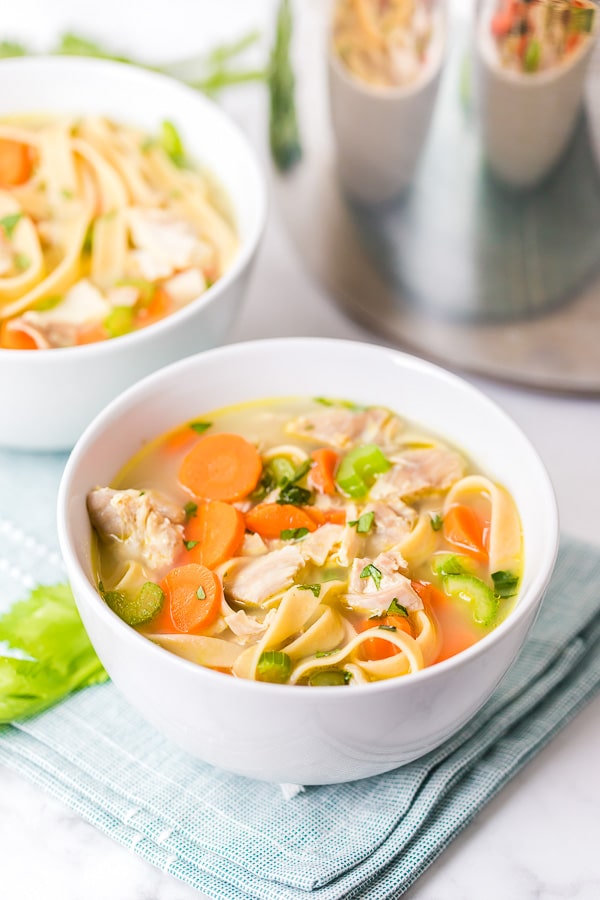 two bowls of turkey noodle soup