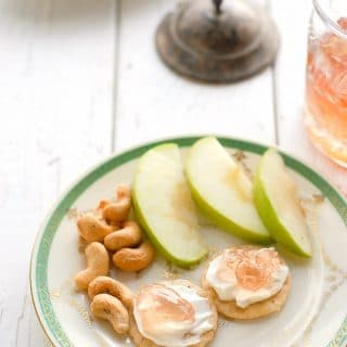 Homemade Pink Champagne Jelly recipe with apple slices and cream cheese