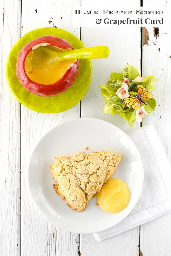 Black Pepper Scones with Grapefruit Curd on white platea