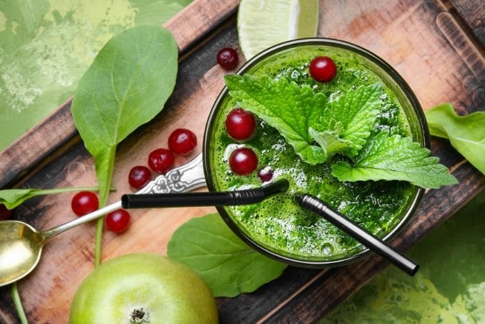 green smoothie with red berries