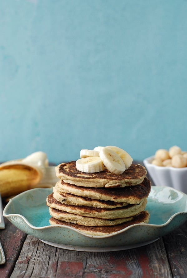 Banana-Macadamia Nut Pancakes with Coconut Syru and bananas