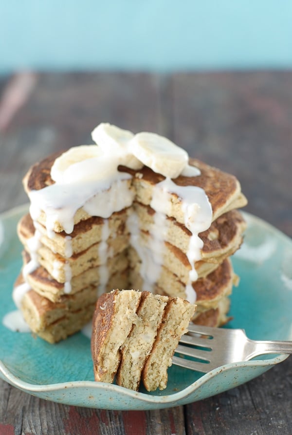 Banana-Macadamia Nut Pancakes with Coconut Syrup with forkful
