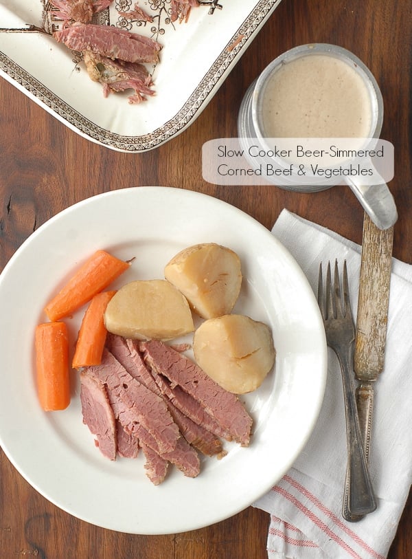 Slow Cooker Beer-Simmered Corned Beef on white plate