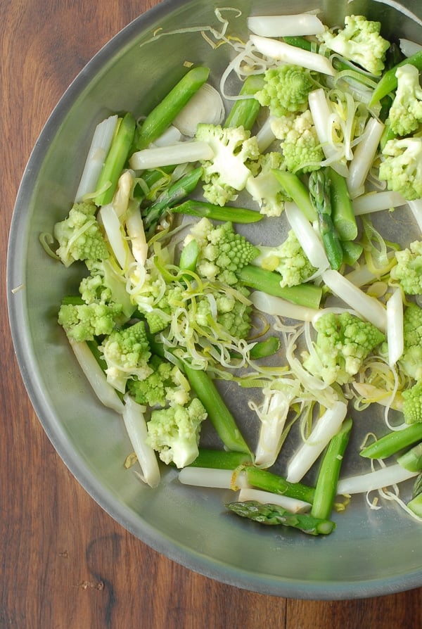 Springtime Vegetables Aspargus Leek Romanesco in skillet