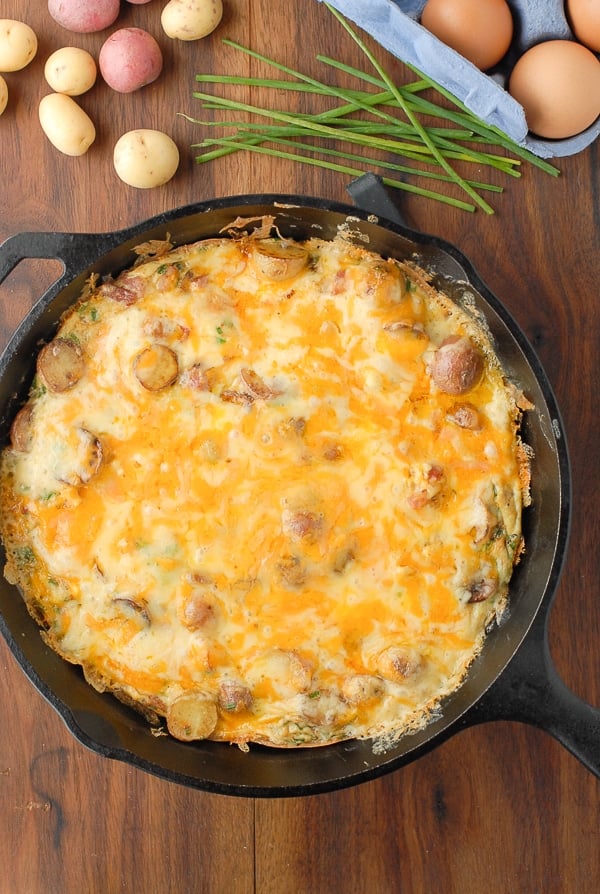 Smoky Ham Cheese Potato Frittata in a cast iron skillet