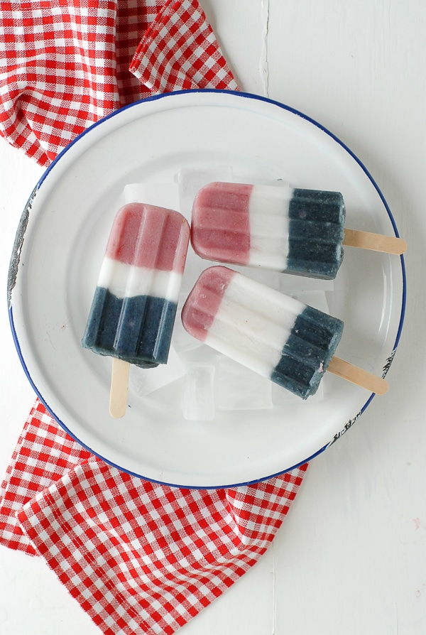 Patriotic Smoothie Popsicles on white metal plate