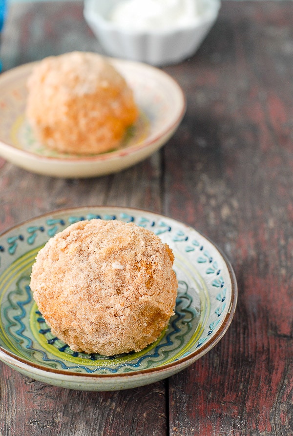 churro fried ice cream on a green plate